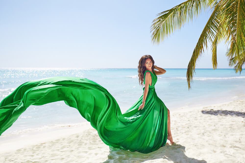 green dress with a long tail